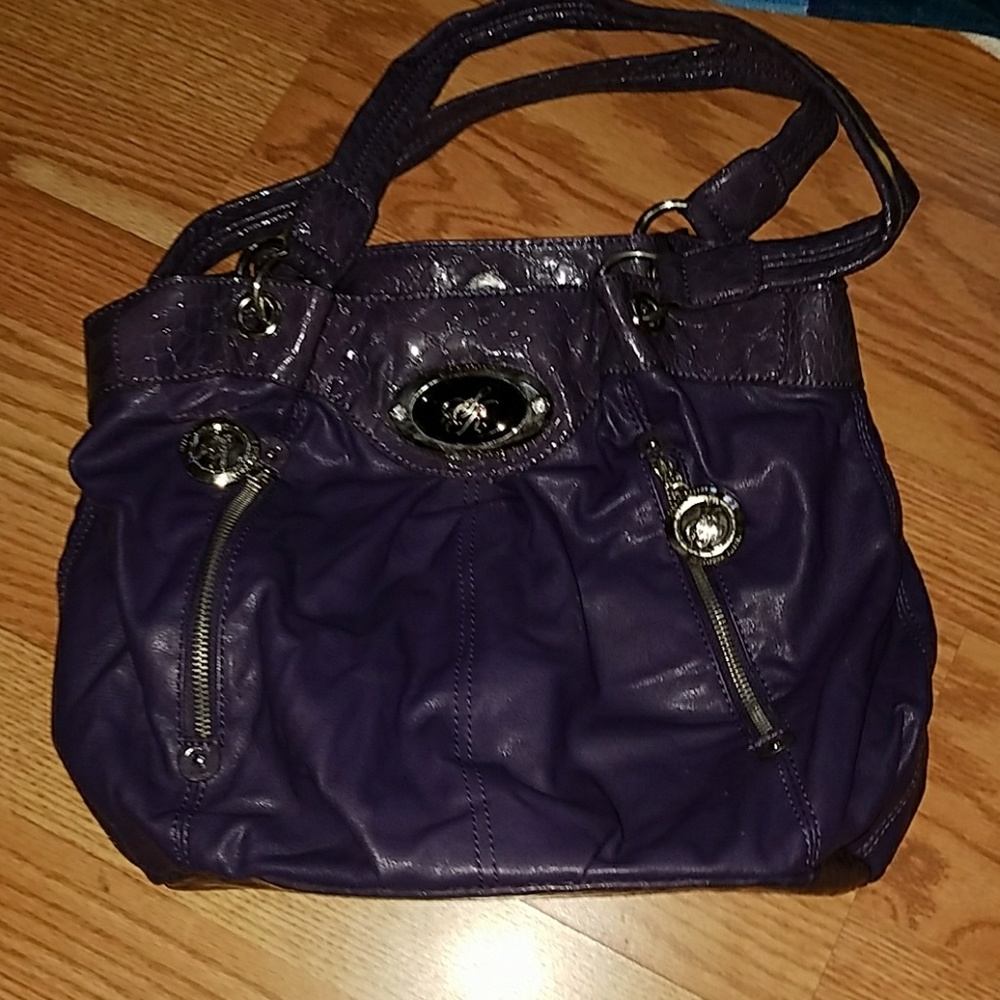 Purple handbag.